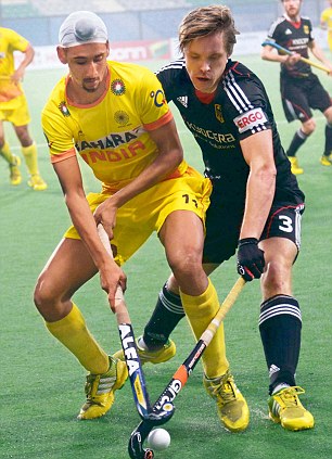 The heroes of the victory were teenager
Mandeep Singh (left), who scored three goals,
and Rupinder Pal Singh (not pictured), who found the
target with two thunderous drag-flicks