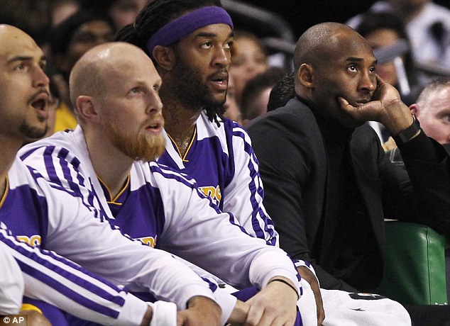 The day after attending a marketing class at Boston College, Kobe Bryant watched his Lakers teammates play from the bench at the Friday night game against the Boston Celtics