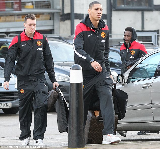 Return: Phil Jones (left) also made the trip to London after recovering from knee injury