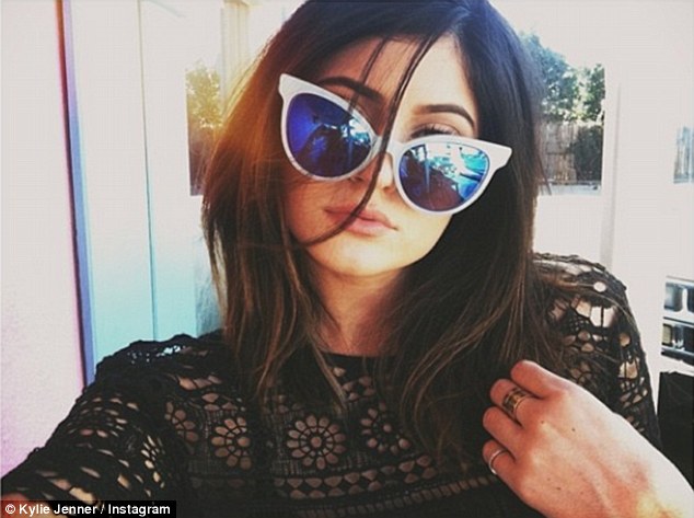 Blue again: Kylie Jenner, 16, posted a snap of herself on Instagram on Saturday looking a bit forlorn