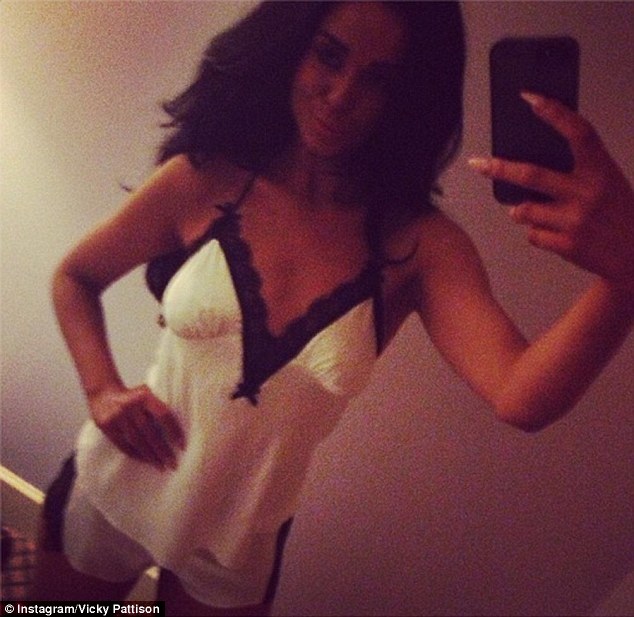 A night in has never looked so good: Vicky Pattison displayed her slim physique in a plunging lingerie-inspired vest top and skimpy matching monochrome shorts as she posed for a selfie on Saturday night