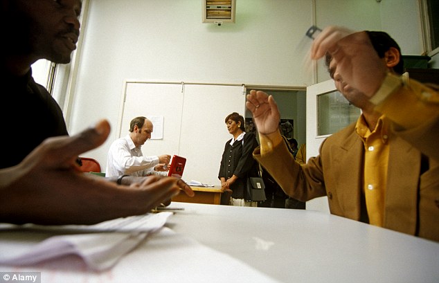 Communicating: Immigrants getting help from civil servants in Newcastle