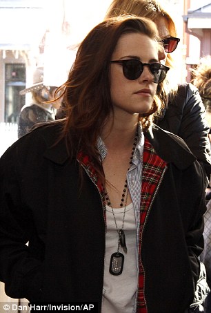 Cool operator: Kristen donned retro black shades later in the day