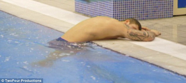 This is exhausting: Dan enjoys a time out on the side of the pool