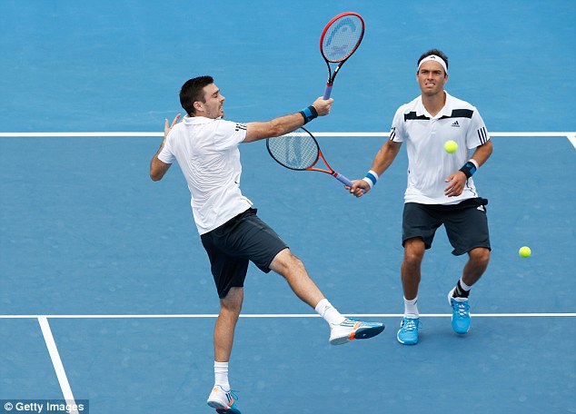 Multi-ball: Fleming and Hutchins during the warm-up in Melbourne