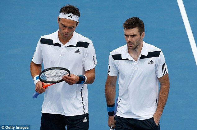 Early exit: Colin Fleming and Ross Hutchins have set their sights on a Davis Cup place after losing in the Australian Open second round to Rohan Bopanna and Aisam-Ul-Haq of Pakistan