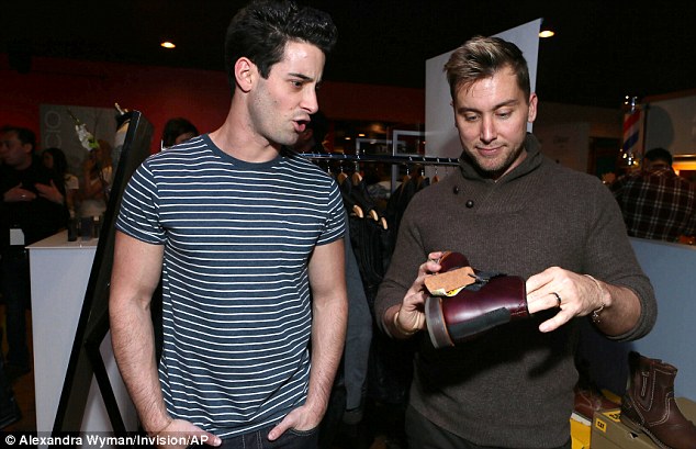 Boots: Lance and fiance Michael attended the TR Suites to pick out a pair of brown CAT Footwear boots