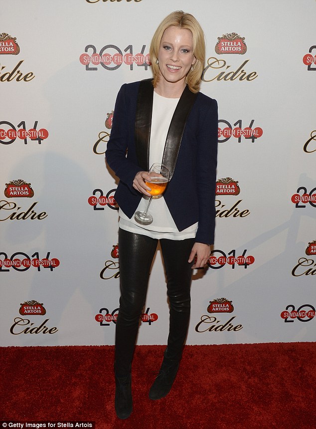 Sleek: Elizabeth Banks wore leather trousers and a blazer as she sipped on a beer at the Stella Artois event