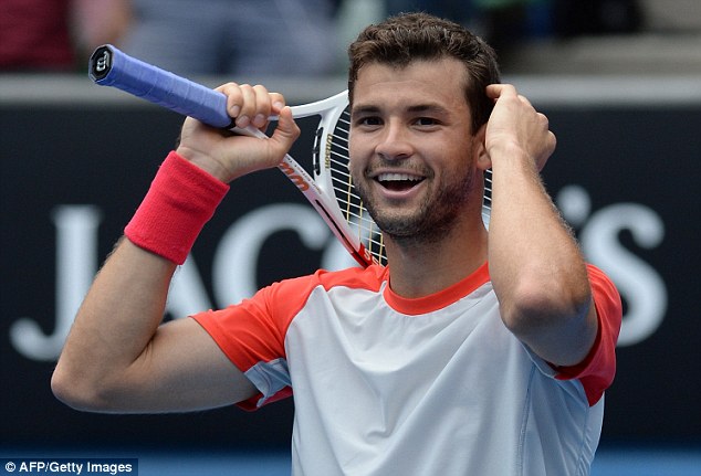 Marching on: Grigor Dimitrov celebrates his victory against Canada's Milos Raonic