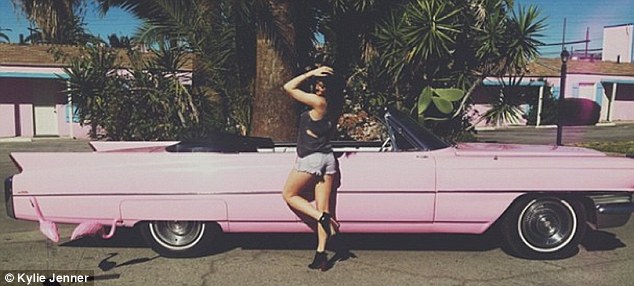 Pink my ride: Kylie posted an Instagram of her with the Pink Motel's pink Cadillac during the shoot