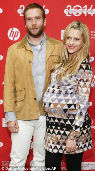 Standing by (and in front of) her man: Teresa and husband Mark Webber, who stars in the film, which received good reviews. The couple were married last month