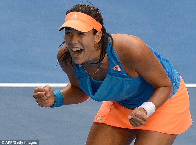 Big win: Garbine Muguruza celebrates her victory over Wozniacki