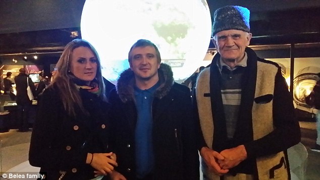 Family: Mr Belea is pictured (right) with his two children - Ciprian (centre) and Alina (left) - on Sunday at the Science Museum