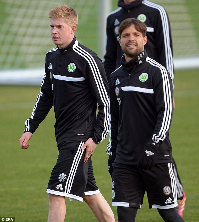 Nice to meet you: De Bruyne is introduced to new teammate Diego on his first morning with the Bundesliga side