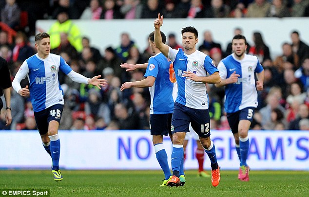 Not enough: Blackburn's Ben Marshall celebrates with team-mates after netting for Rovers