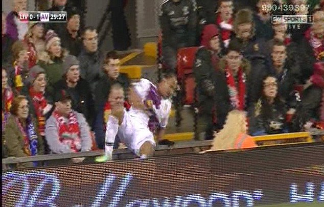 Hard landing: The striker ends up falling on his back