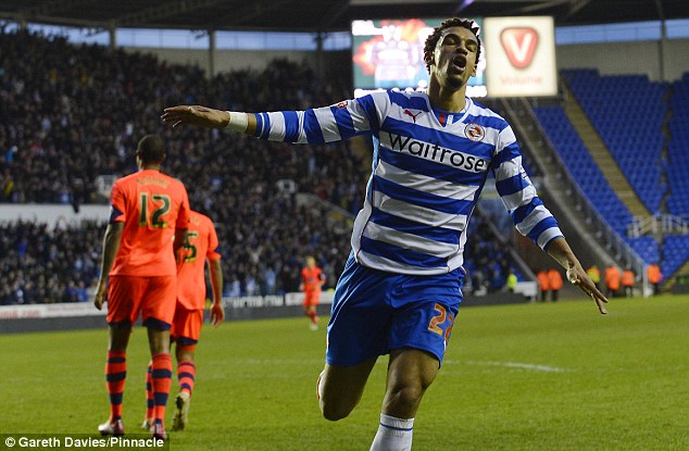 Finishing touch: Nick Blackman finishes the scoring for Reading