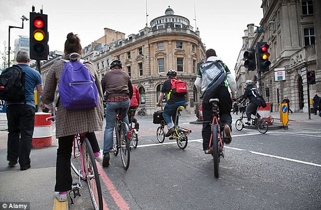 More than 11,000 law-breaking cyclists were  fined for riding on pavements and running red lights last year