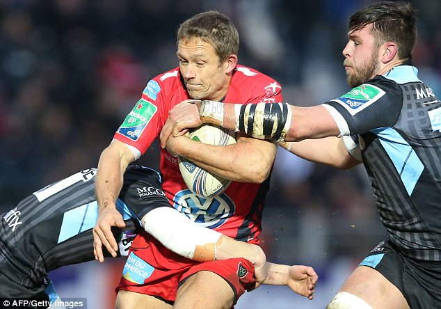 On the charge: Toulon's Jonny Wilkinson attempts to burst through Glasgow defence