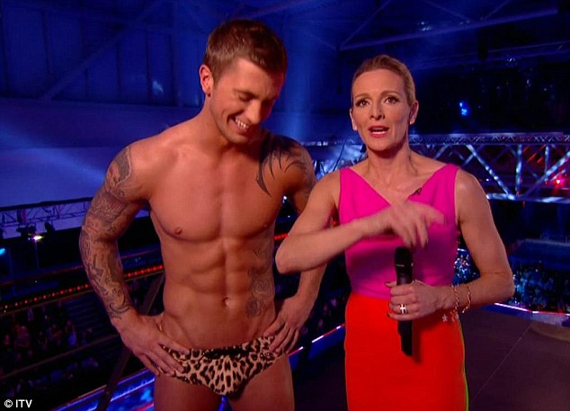 Impressed: TV host Gabby Logan didn't know where to look as Dan appeared in tight trunks