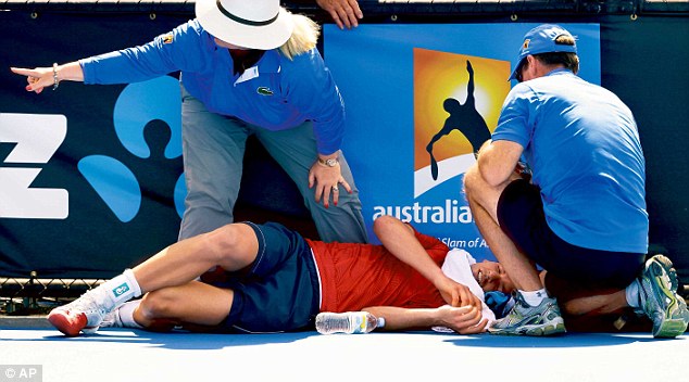 Fainting: Frank Dancevic collapsed during his first-round match with Benoit Paire on the second day