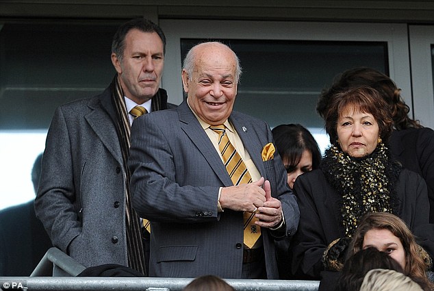 Mission: Hull City owner Assem Allam (centre) is determined to change the club's name to the Hull Tigers