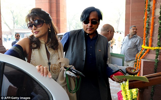 Mrs Pushkar Tharoor and her husband in 2012. The couple were described as 'very much in love' by son