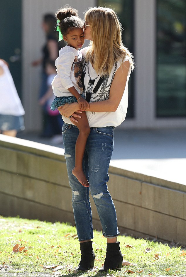 And more kisses! Lou got a lot of attention from her famous mother on Saturday