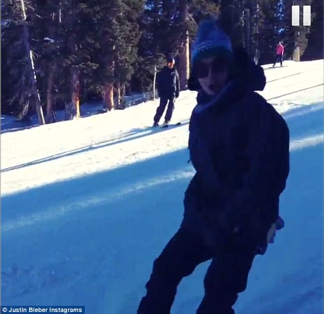 He's trying: The singer looks more comfortable on a stage in front of thousands than he does on the snow