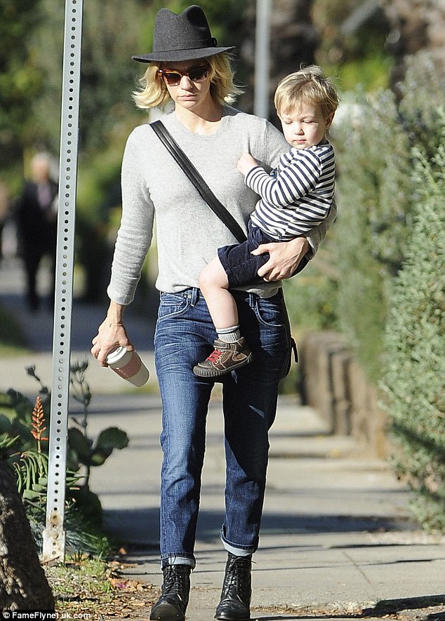 Carrying on: January Jones carries her son Xander around Los Feliz in California on Saturday