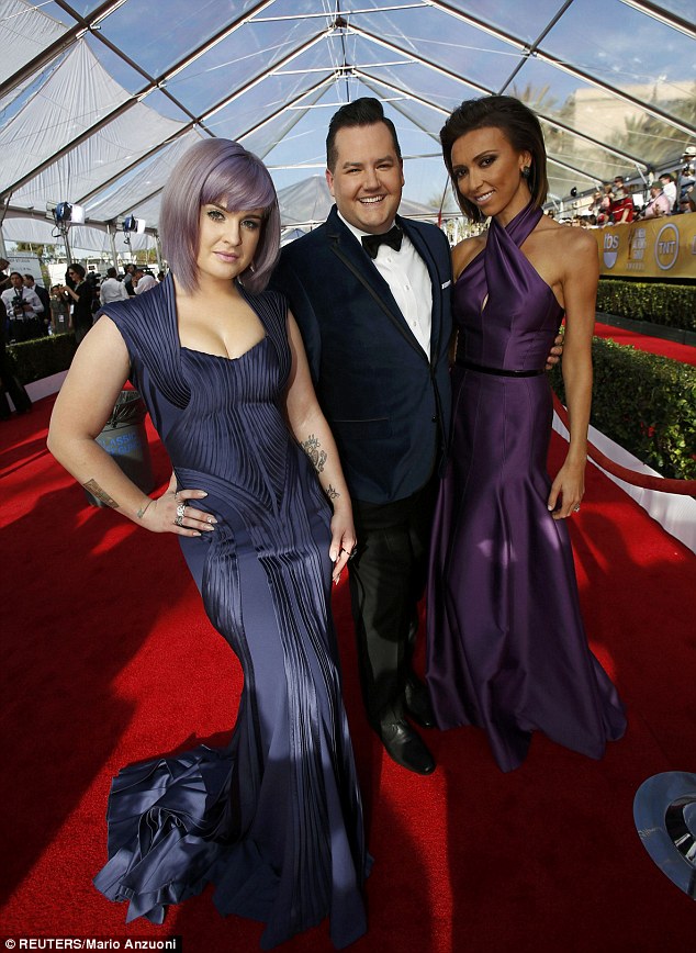 Pretty in purple: The Fashion Police judge was joined at the Shrine Auditorium by her fellow presenters Ross Mathews and Giuliana Rancic