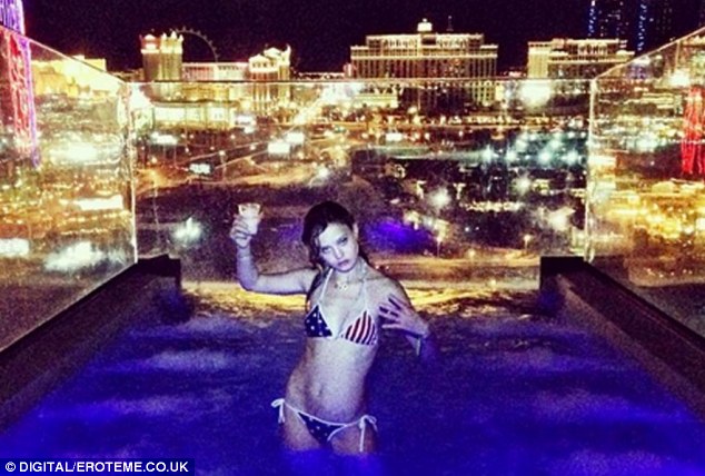 Party girl: Georgia May Jagger poses in the hotel pool for a photograph captioned 'Birthday madness @lizzyjagger performing cirque de soleil 'O' in the pool