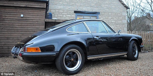 Classy: Kate Moss's Porsche 911, parked outside The Five Alls pub in the Cotswalds