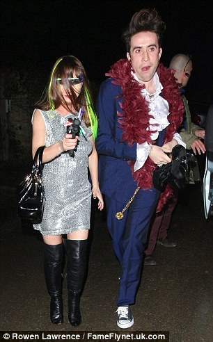 Radio Gaga: Nick Grimshaw makes his way into Kate Moss's 40th birthday bash sporting a feather boa