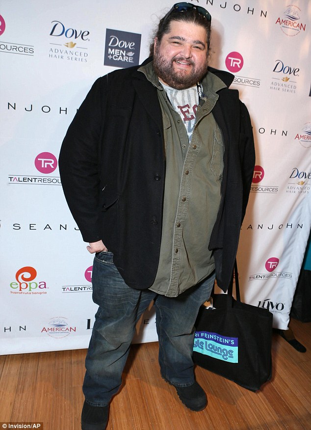 Pictured: Jorge Garcia was photographed at the gifting suite, looking casual in jeans and a green button up shirt