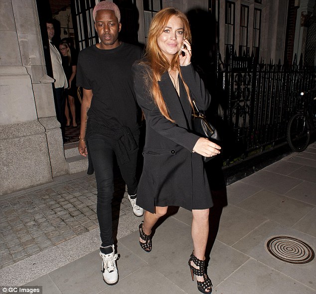 Hanging on the telephone! The Hollywood Actress was joined by TOWIE newcomer Vas Morgan, who both opted for black outfits