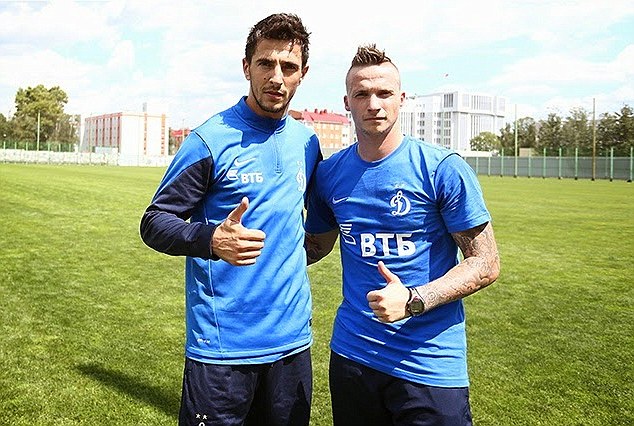 Arrival: Alexander Buttner (right) pictured with Stanislav Moanolev in Dinamo Moscow's training kit