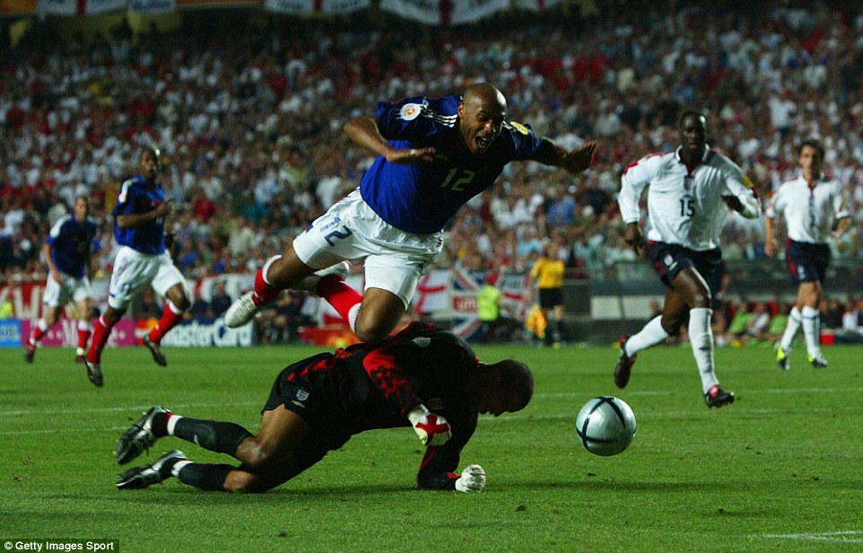 David James brings down Henry in the dying moments of England Euro 2004 group match with France, sparking a late comeback 