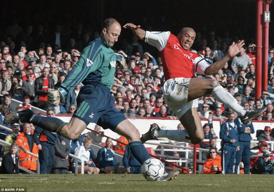 Showing customary perseverance to charge down Tottenham goalkeeper Kasey Keller in a north London derby at Highbury