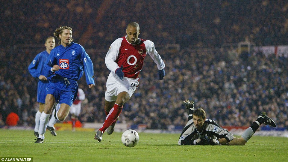 Henry leaves Robbie Savage and goalkeeper Nico Vaesen for dead during a 4-0 win over Birmingham City in January 2003