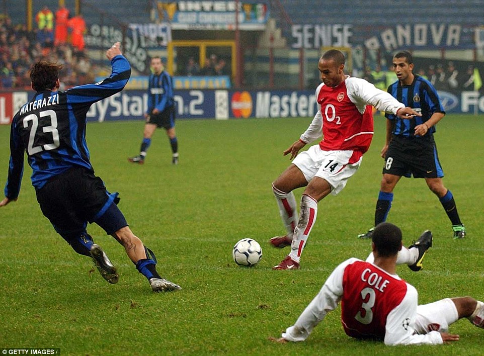 Henry manages to find the net despite a crowded penalty box as Arsenal take the lead at Inter Milan in November 2003. They won 5-1