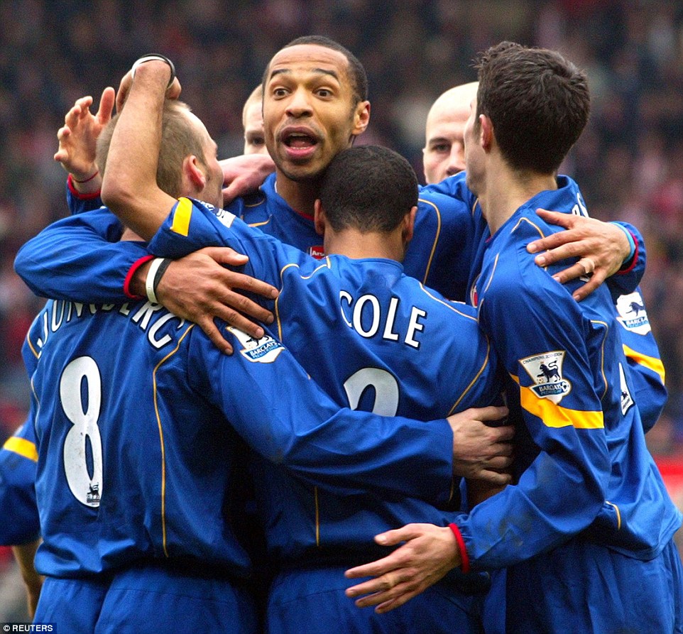 Henry is right in the midst of the celebrations after Freddie Ljungberg scored at Southampton in February 2005