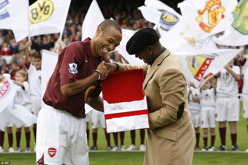 And Wright was on hand to present Henry with a special memento to mark the record before a match with Man City in October 2005