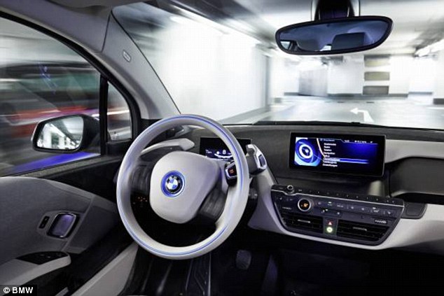 When the driver comes back they speak into the watch again to be picked up (shown). BMW says it is more precise than existing GPS systems. They have also revealed a 360-degree collision avoidance system