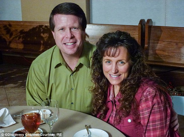 Tradition: Celebrating Christmas is a big tradition where the family focuses on the religious connection; seen above, Jim Bob and Michelle pose together in their reality series