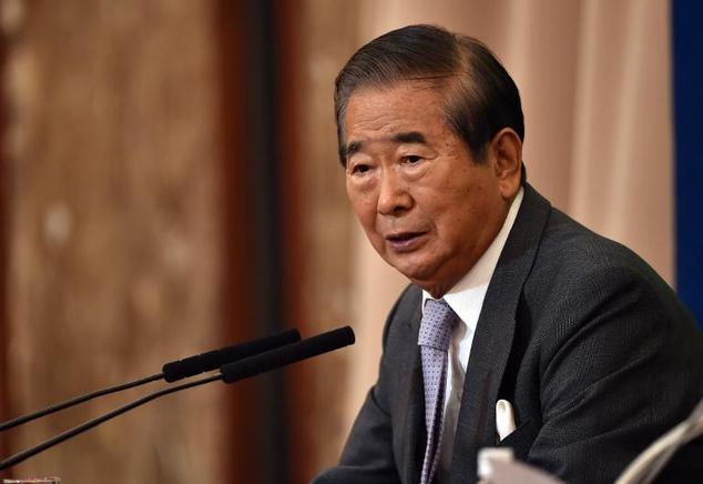 Former Japanese parliament member Shintaro Ishihara speaks to the media at the national press club in Tokyo on December 16, 2014