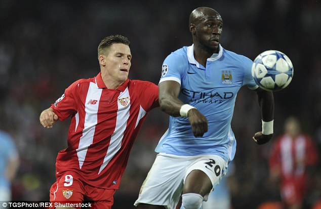 Eliaquim Mangala (right) has improved after a disastrous start to his career at Manchester City