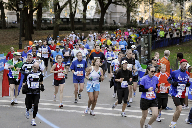 FILE - In this Nov. 7, 2010 file photo, runners enter Central Park on their way to the finish of the New York City Marathon. (AP Photo/Kathy Kmonicek, File)