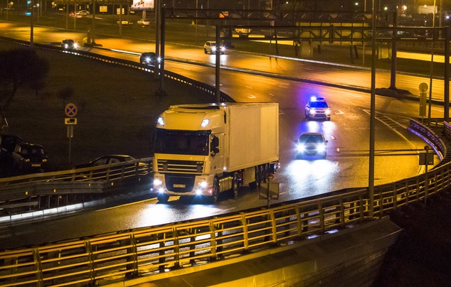 A truck of Russian Ministry for Emergency, followed by police cars, carries the bodies of the victims loaded from the ministry's plane in St. Petersburg, Rus...