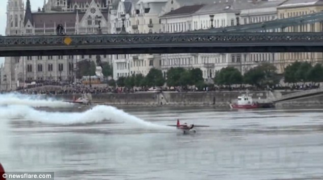 In trouble: In a spectacular display of talent the planes zoom under the suspension bridge 